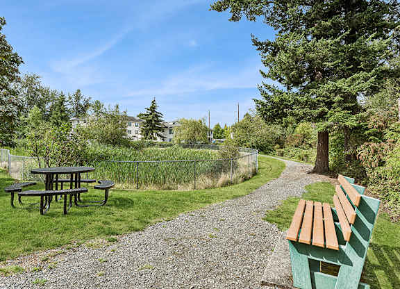 Picnic table and pathway at Woodrose Senior Affordable Apartments in Bellingham WA