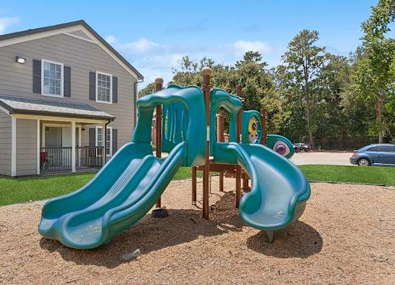 Playround slide at Park Village Apartments in Conroe TX