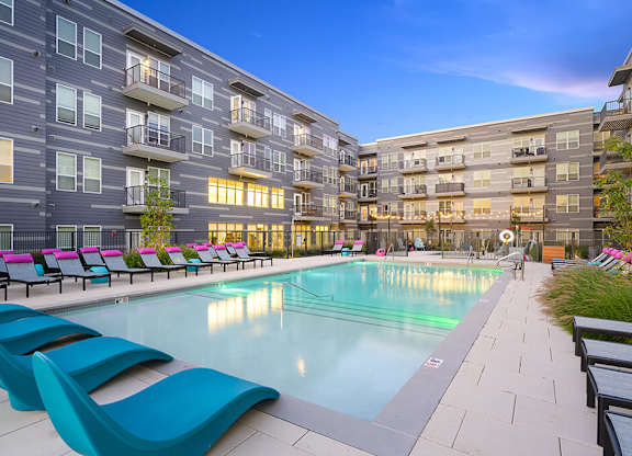 Pool and Lounge Chairs at V2 Apartments in Cheslea MA