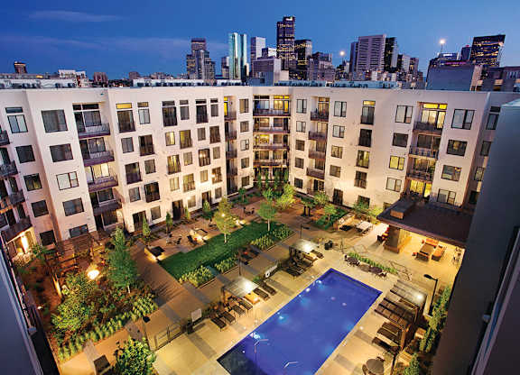 Aerial view of the pool and building at The Douglas Apartments in Denver