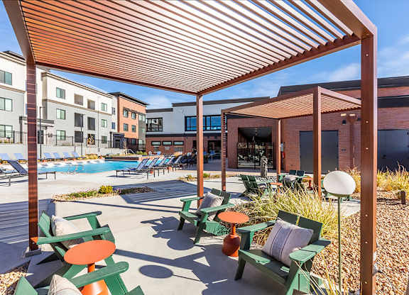 Pool courtyard seating area at Olivean Apartments in Broomfield CO