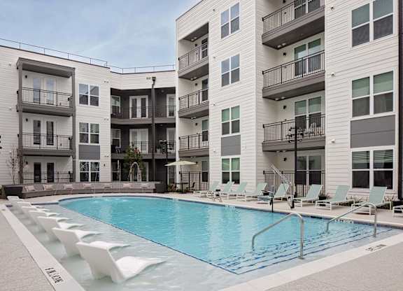 Poolside seating at Wayfern Apartments in Sandy Springs GA