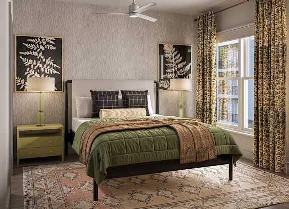 Bedroom with window at The Penstone Apartments and Townhomes in South Walpole MA