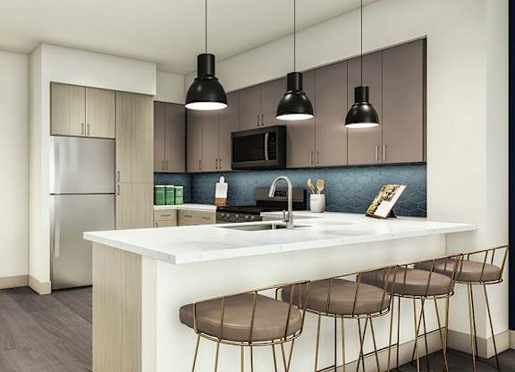 Kitchen with breakfast bar at Altitude Apartments in South San Francisco CA