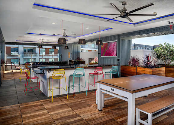 Rooftop Euphoria Table and Kitchen at Chroma Apartment Homes in Canoga Park CA