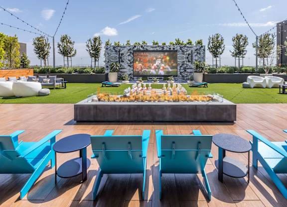 Rooftop lounge with theatre at Avel Apartment Homes in Orange CA