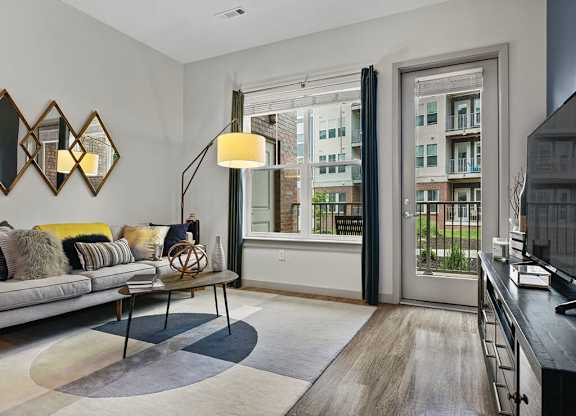 Living room furnished at The Slate at Andover Apartments in Andover MA