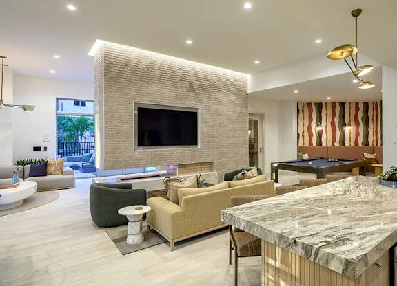 Social lounge fire place at Treo Apartments in Fort Lauderdale FL