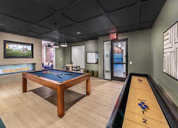 Social lounge game area at Luca Apartments in Austin TX