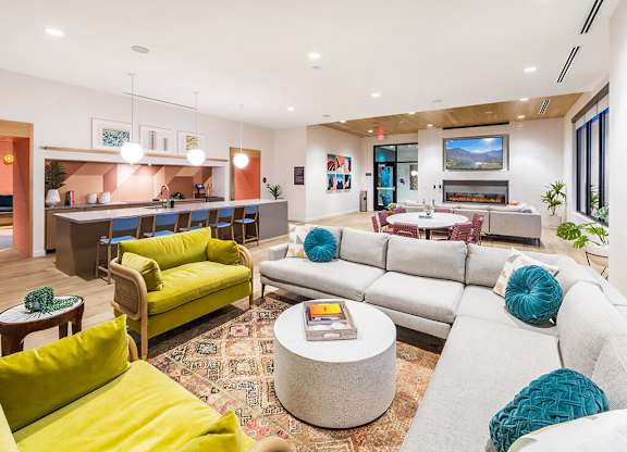 Social Lounge Seating and Kitchen at Embark Apartments in Fremont CA