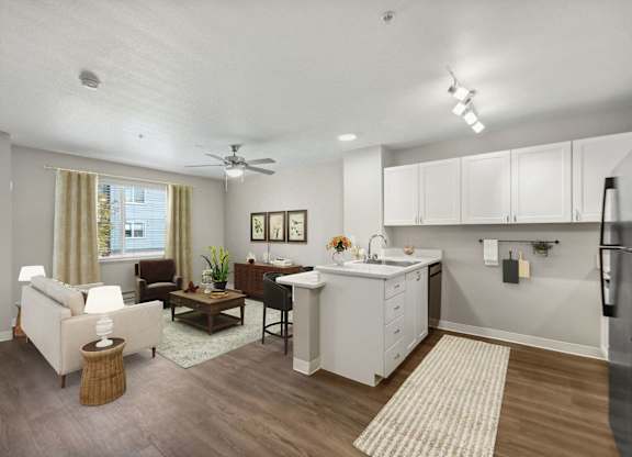 Model Kitchen and Living Room at Auburn Court Apartments in Auburn WA