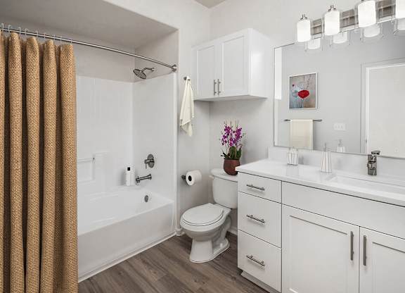 Bathroom with shower at Vintara Apartments in Murrieta CA