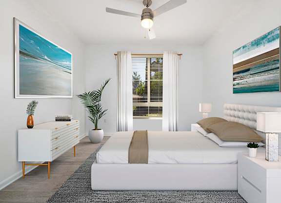 Bedroom with ceiling fan at Landara Apartments in Ontario CA