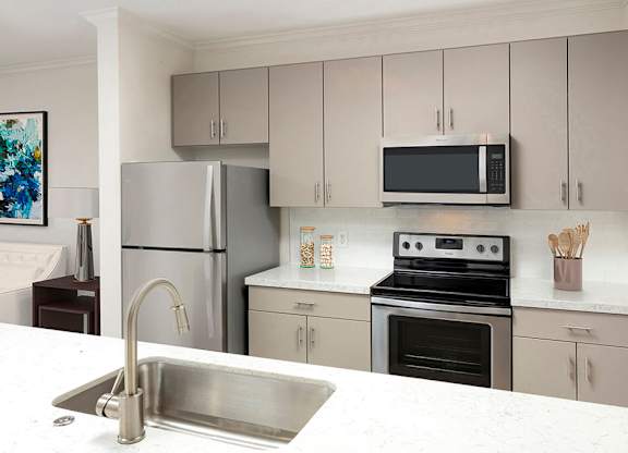 Kitchen with appliances at Landara Apartments in Ontario CA