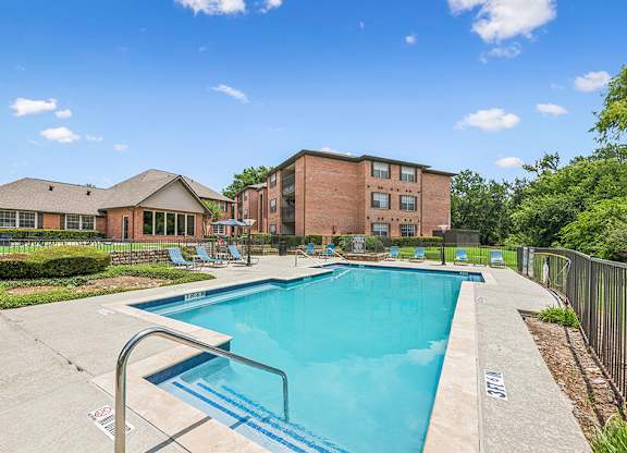 Swimming pool with sundeck access at Valley Ridge Apartments in Lewisville TX