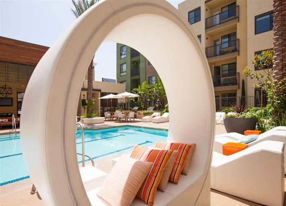 Covered pool seating at Terrena Apartments in Northridge, CA