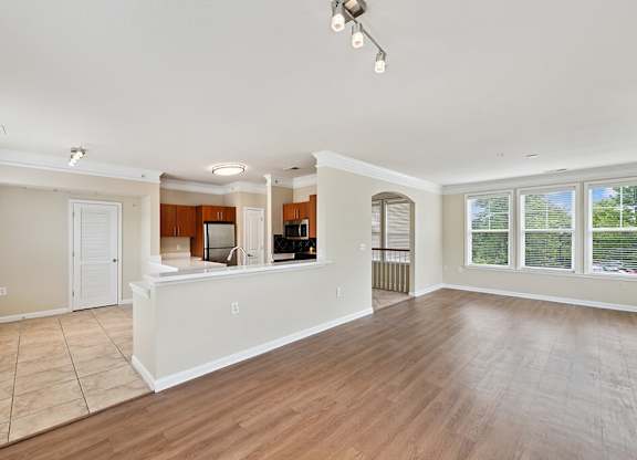 Living room with view of kitchen at Westerchester at the Pavillions in Waldorf MD