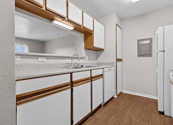 Traditional kitchen with breakfast bar at Valley Ridge Apartments in Lewisville TX