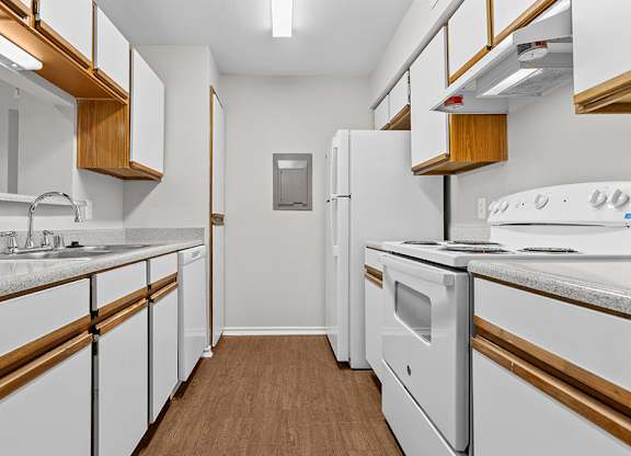 Traditional kitchen with dishwasher at Valley Ridge Apartments in Lewisville TX