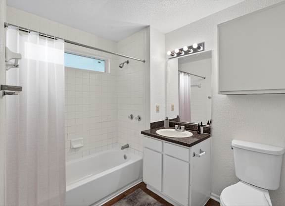 Bathroom at Dayton Park Apartments in Dayton TX