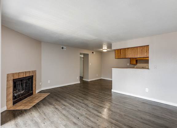 Kitchen with wood cabinets at Mission James Place Apartments in Austin TX