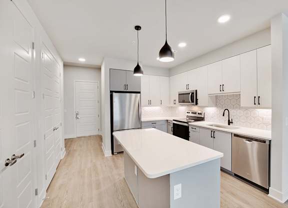 Chrome Design Package Kitchen at 1810 Main Apartments in Houston TX