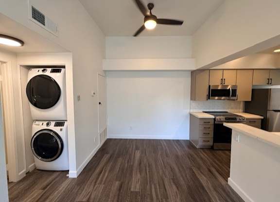 A laundry room with a washer and dryer.