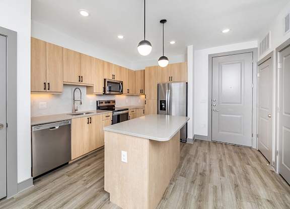 Kitchen in latte design at Cala Apartments in Austin TX