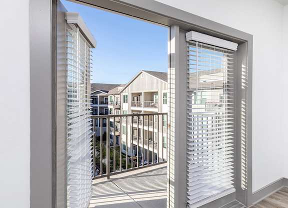 Large window to patio at Cala Apartments in Austin TX