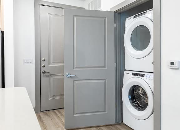 Stacked unit laundry at Cala Apartments in Austin TX
