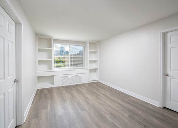 Vacant Living Room with Built Ins at il Palazzo Apartments in San Diego CA