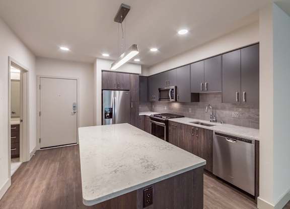 Vacant Mineral Design Package Kitchen at North at Totem Lake Apartments in Kirkland WA