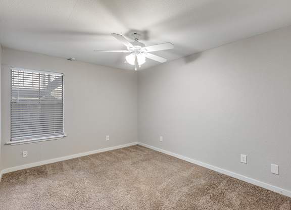 Primary bedroom at Mission James Place Apartments in Austin TX