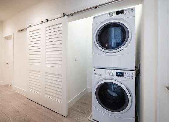 In unit washing machine and dryer at The Cove at Tiburon Apartments in Tiburon CA