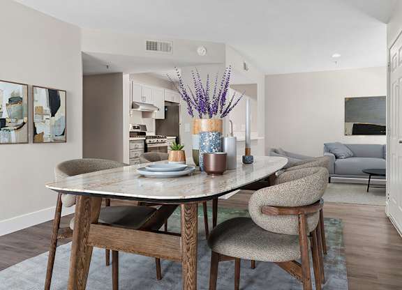 Renovated dining and living area at Deerwood Apartments in Corona CA