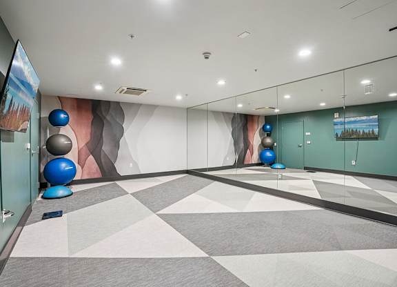 Yoga Room Mirror Wall at Haven at Del Mar Station Apartments in Pasadena CA