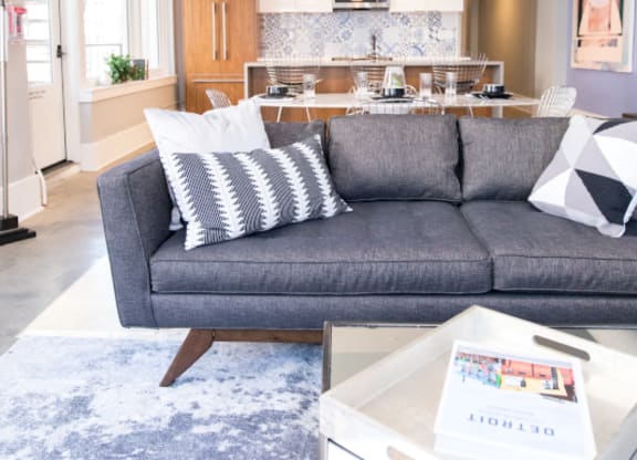 Living Room with a Grey Couch at Fourteen56, Detroit, MI