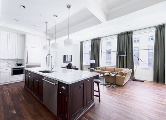 Kitchen with island and stainless steel appliances at Vinton, Detroit, Michigan.