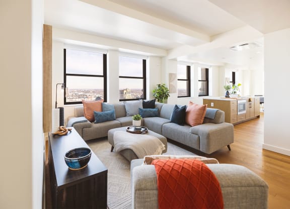 Two bedroom penthouse living room with city views at Book Tower, Michigan, 48226