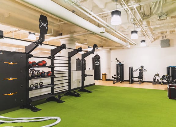 Indoor fitness area at The May, featuring a variety of state of the art gym equipment.