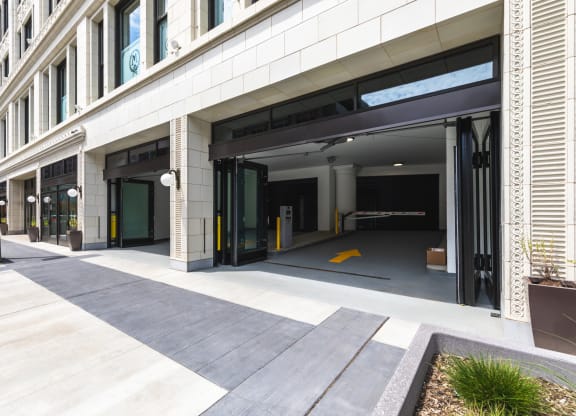 Parking garage entrance with sliding doors. at The May, Cleveland, OH, 44114