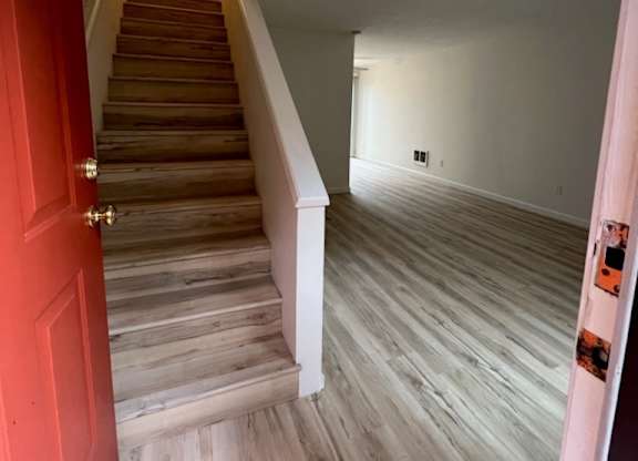 a view of the stairs from the living room