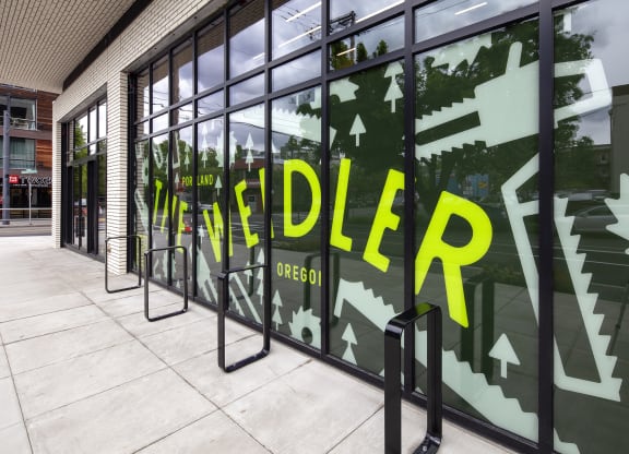 a window display with the worddrips on it at The Weidler in Portland, OR 97209
