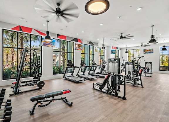 the gym is equipped with a variety of exercise equipment at Altis Grand Suncoast, Florida