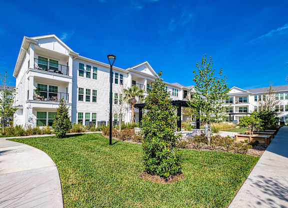exterior view of apartments at the preserve at city center apartments at Altis Grand Suncoast, Florida, 34638
