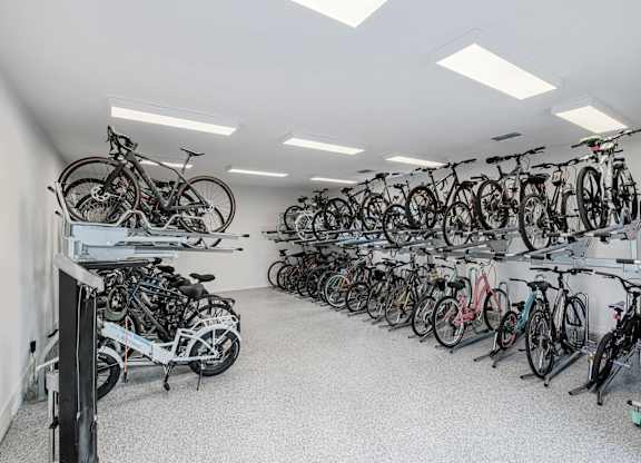 A bike shop with many bikes on display.