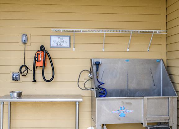A grooming station with a sign that says