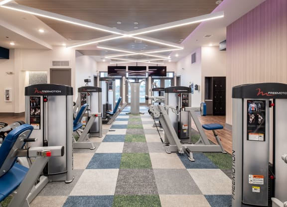 Lewisville, TX Apartments - Hebron 121 Station - 2-story, Tech Advanced Fitness Center Equipped With Multiple Strength Training Machines, T.Vs, And Water Fountain Station,