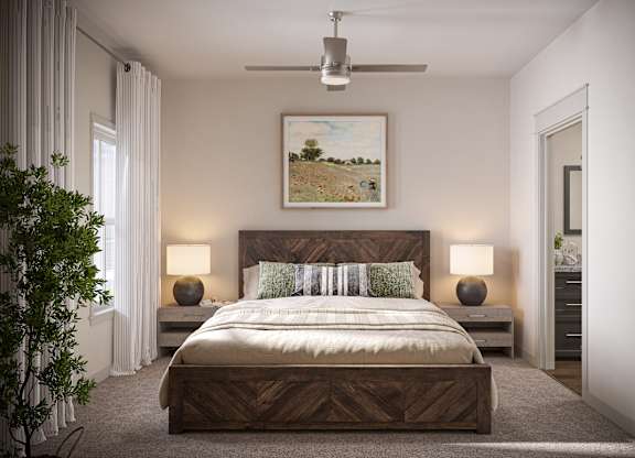 a bedroom with a bed and a ceiling fan at Allier Port Wentworth Apartments, Port Wentworth 31407