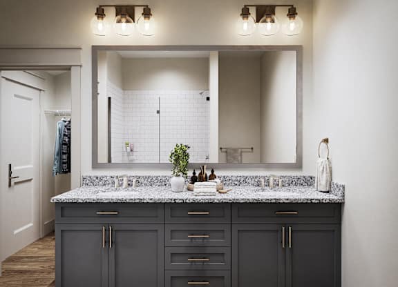 a bathroom with a large mirror and a sink with granite counter tops at Allier Gulf Shores, Gulf Shores Alabama